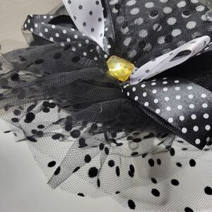 Elegant Black Polka Dot Hat with White Accents